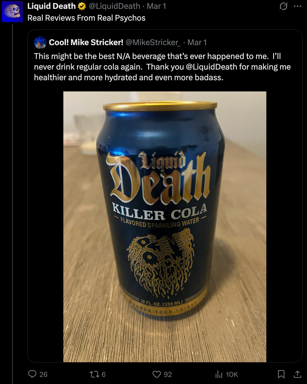 Liquid Death Killer Cola can on a table, with bold gold and black design. Tweet praising the beverage visible above the can.