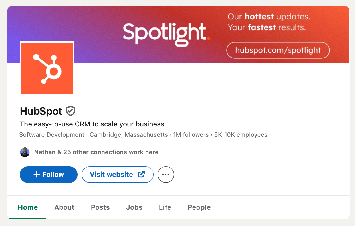 HubSpot profile with an orange logo. Text: "Spotlight. Our hottest updates. Your fastest results." Buttons for follow and visit website.