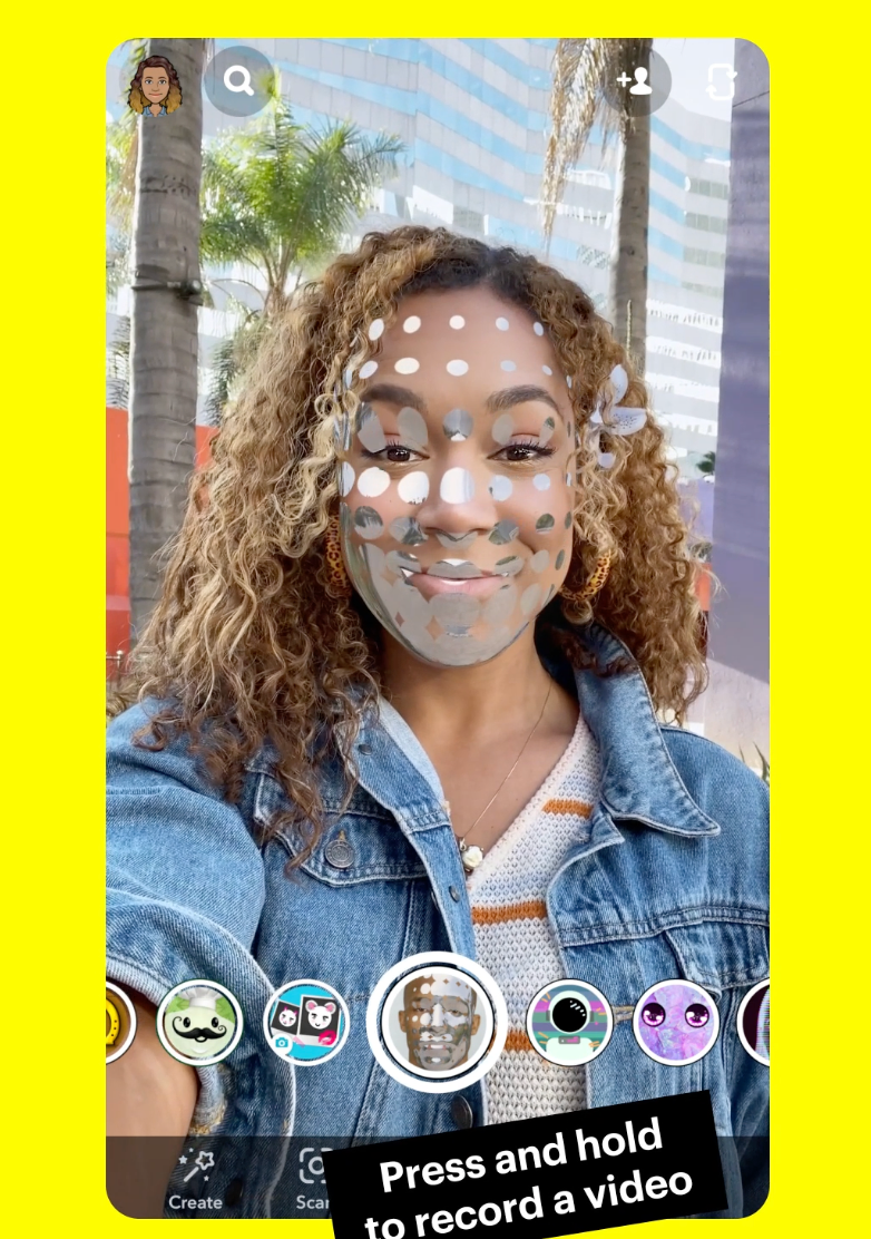 A Snapchat user using a filter