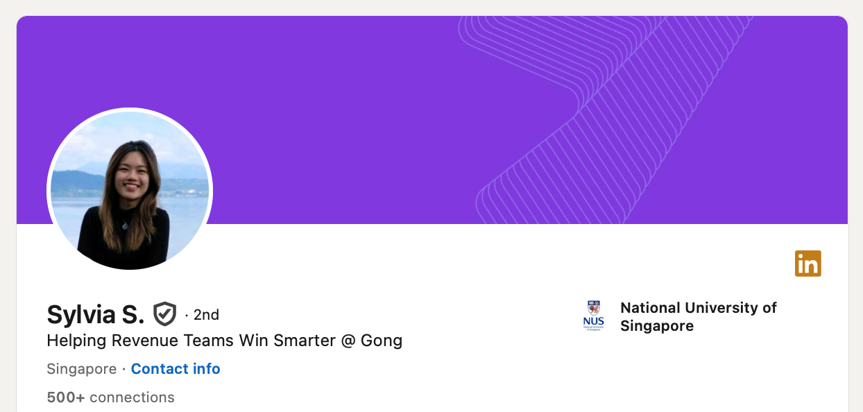 LinkedIn profile header: woman smiling with mountains and water in the background. Text: Sylvia S., helping revenue teams at Gong. Purple design.